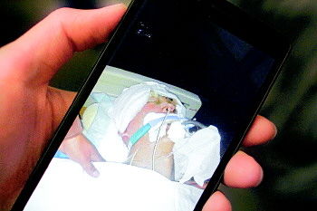 头发长入校遭拒 商河一中高三男生翻墙入校伤