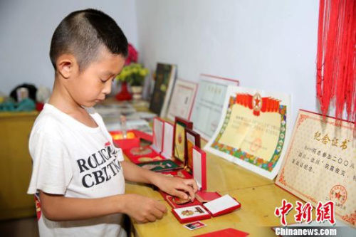 维和牺牲中国军人杨树朋妻子:我们等你回家